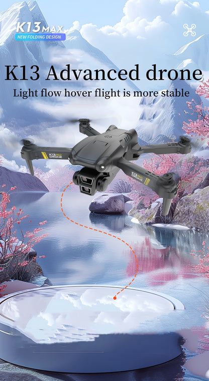 US Local TheK13 Smart Camera Drone With 2 Batteries Features Real-time Image Transmission From A Single Camera. It Has One-click Touch And Landing Functions. This Is A Foldable Remote-controlled Drone Toy, Ma